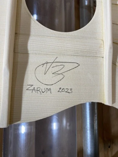 The interior of the completed soundboard is signed and dated by Zarum