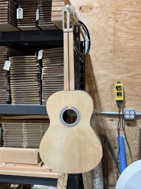 Zarum flamenco model under construction with Cedar top and Pau Ferro sides and back.
