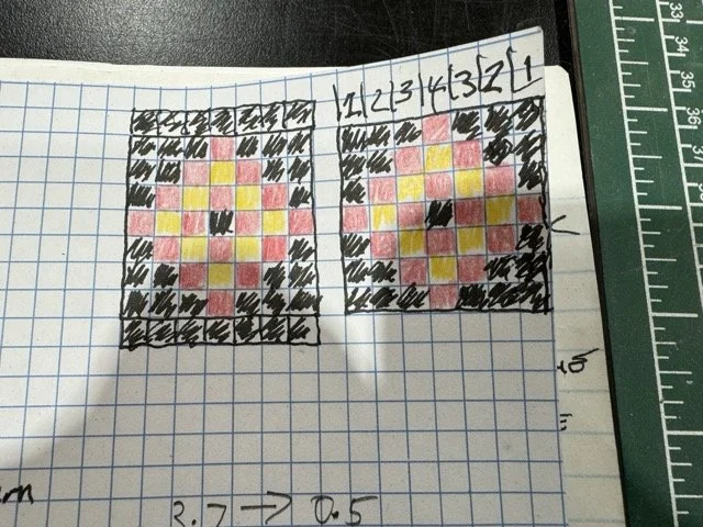 Drawing of one of the components for the Rosette which is the colourful and artistic 'band' around the sound hole made of .5mm pieces of coloured wood. Each square represents .5mm veneer