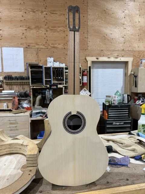 For the first time we see all the components coming together to look like a guitar