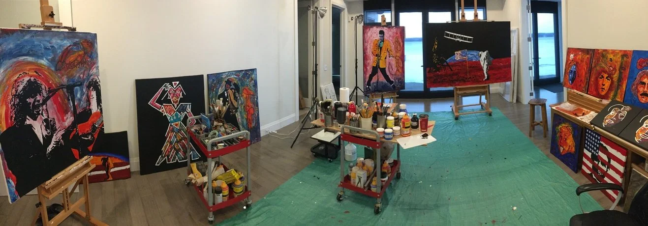 Wide shot of the Zarum studio with the lake showing through the windows