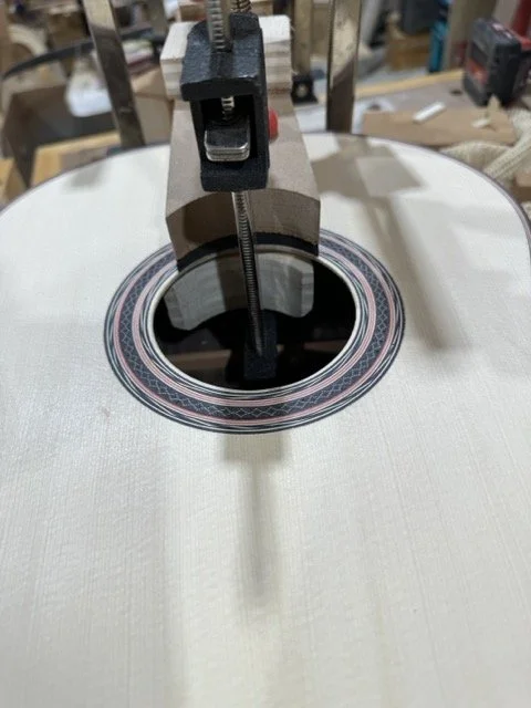 Gluing the fret board to the guitar body