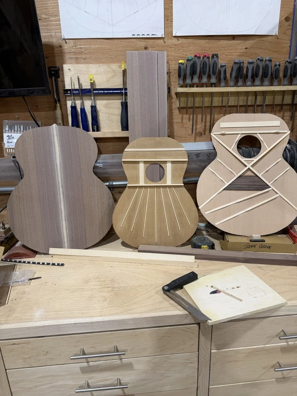 First acoustic build. Shown next to a flamenco soundboard in the middle is the Soundboard and the back of the acoustic guitar.