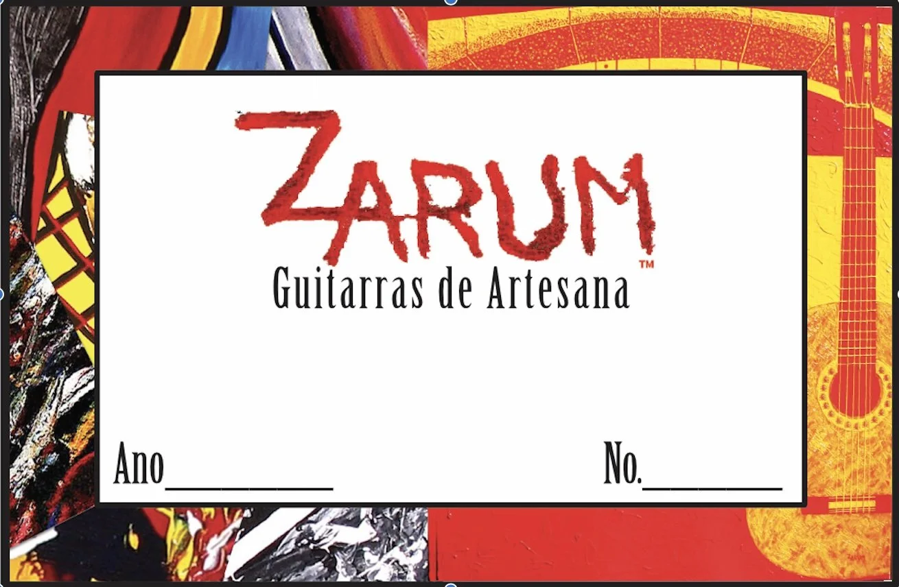 A label for Zarum handcrafted guitars, featuring colorful abstract artwork and a guitar illustration.