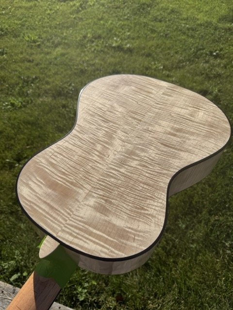 Shown here is a Zarum Flamenco model guitar showing the  Curly Maple back.