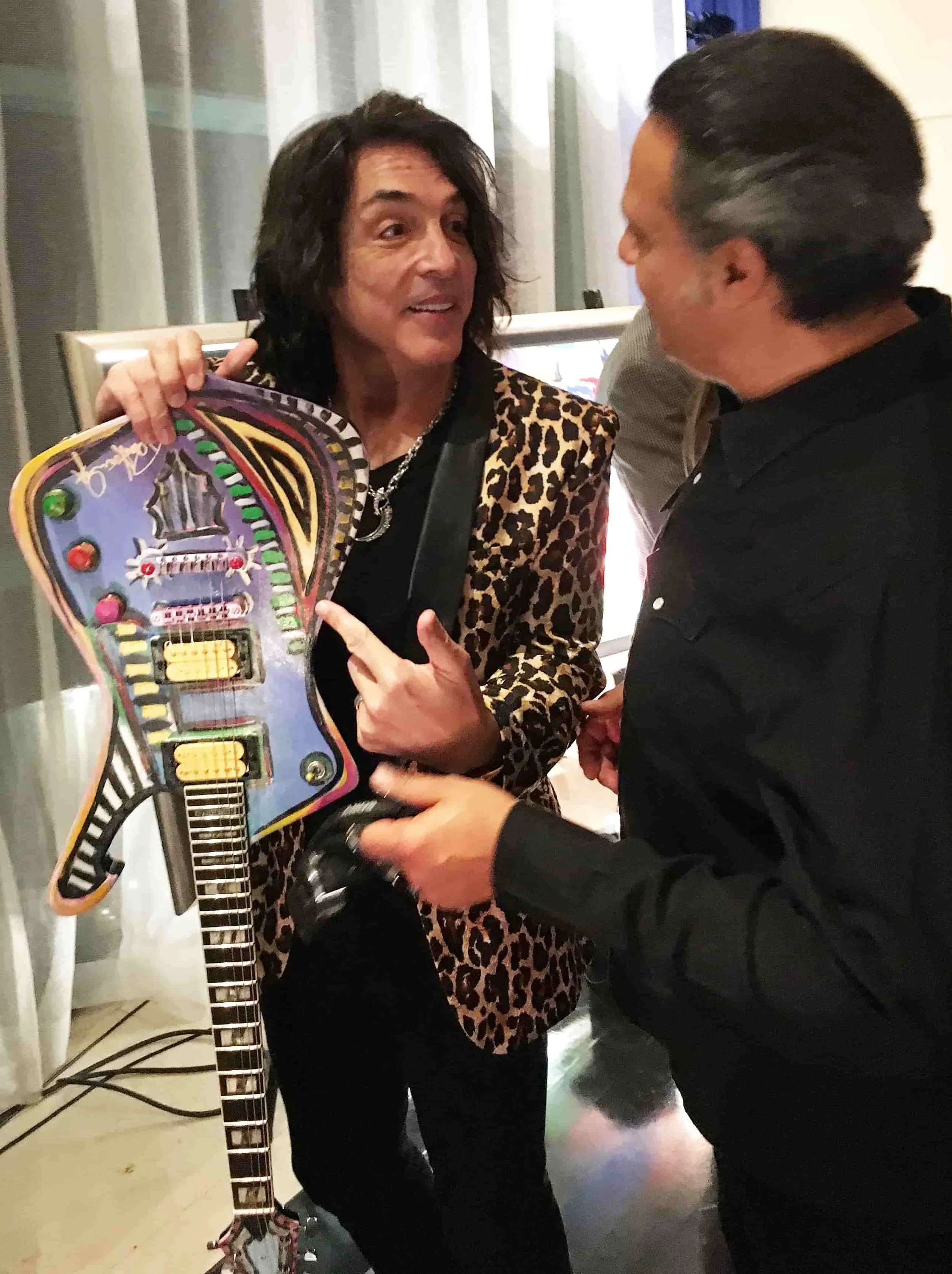 Zarum and KISS band member Paul Stanley having a conversation.