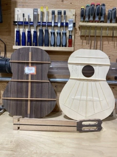 The completed soundboard and the back of the guitar shown with the Zarum label adhered to it. This label will be seen directly under the sound hole of the guitar top
