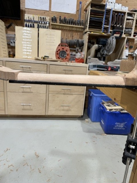 The main part of the neck is now shaped. Note the point where the head meets is still rough.