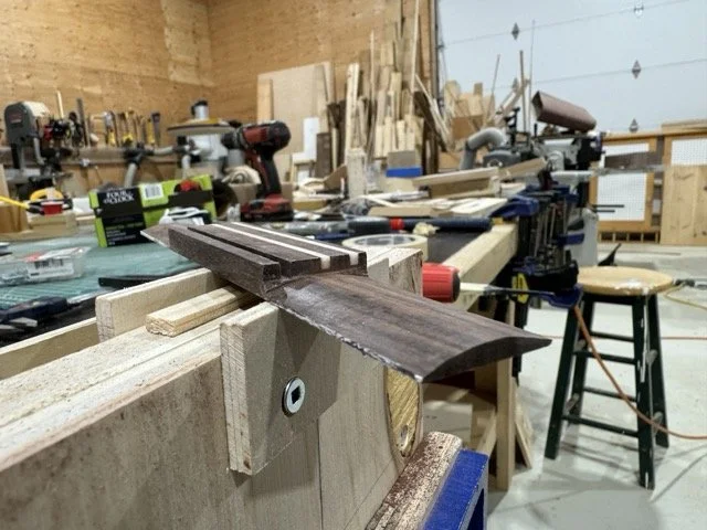 The bridge blank has been rounded and trimmed along each wing