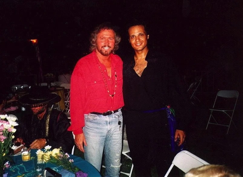 Zarum performing at a charity event held at the home of the

BEE GEES Robin Gibb in South Florida.

Pictured here with Barry Gibb (Maurice Gibb sitting with the hat)