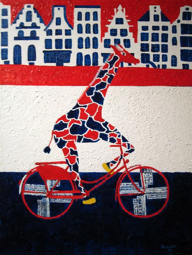Zarum Painting titled 'Giraffes on Bicycles'. Painting of a giraffe riding a red bicycle against a backdrop of stylized European-style buildings, with a red, white, and blue color scheme.