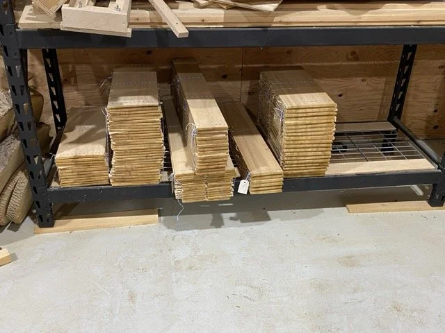 Sorted and labeled ash guitar sides and backs