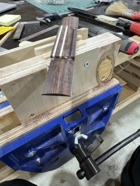 The bridge blank has been rounded and trimmed along each wing