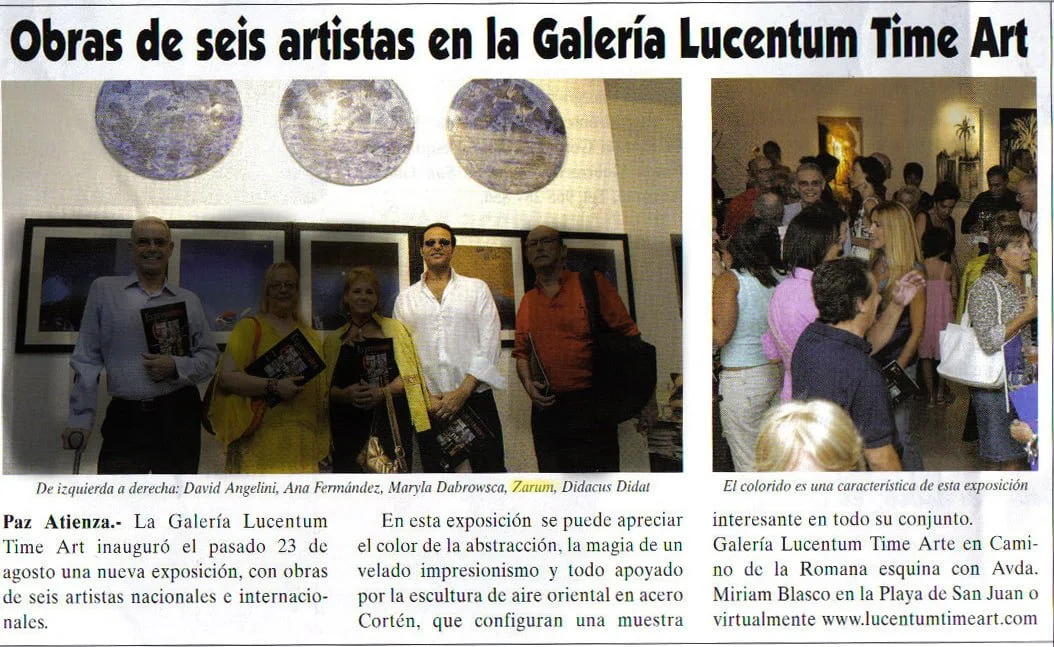 The artist Zarum, art gallery exhibition with people viewing artwork, and a group of five people holding brochures in front of a wall displaying circular and rectangular art pieces.