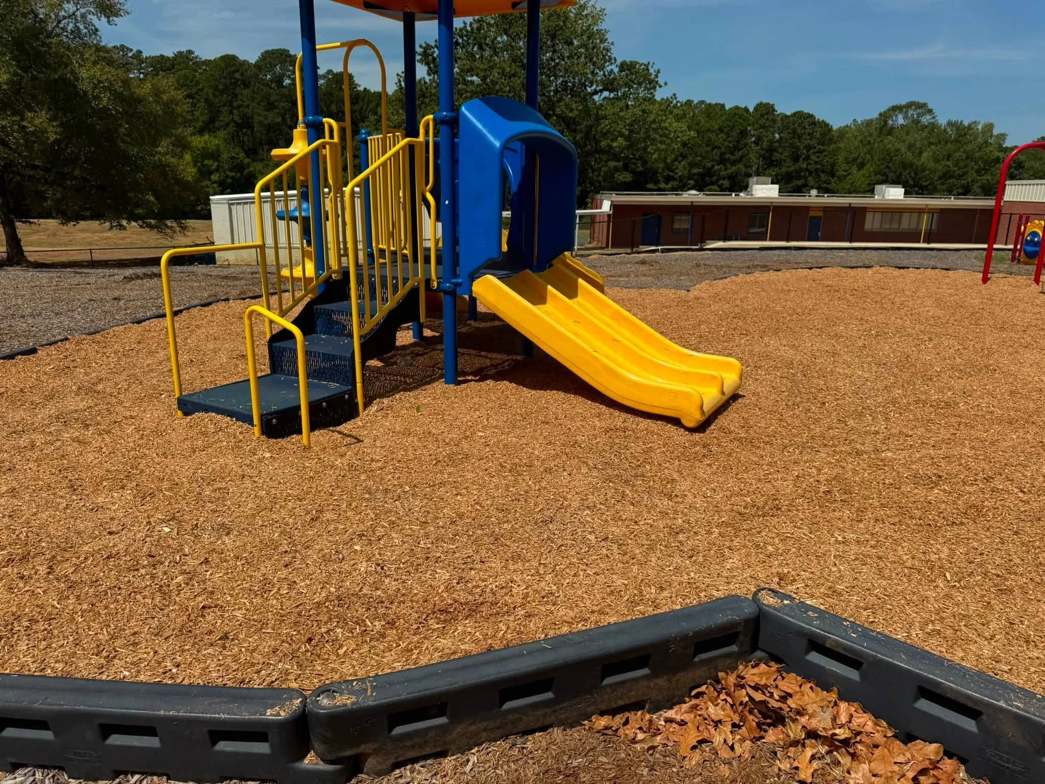 Bullard children's playground yellow slides