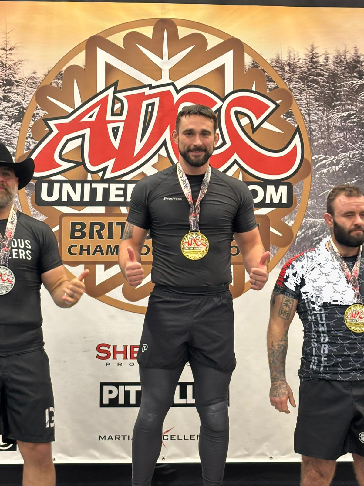 BJJ Coach Jacob with gold medal at ADCC competition