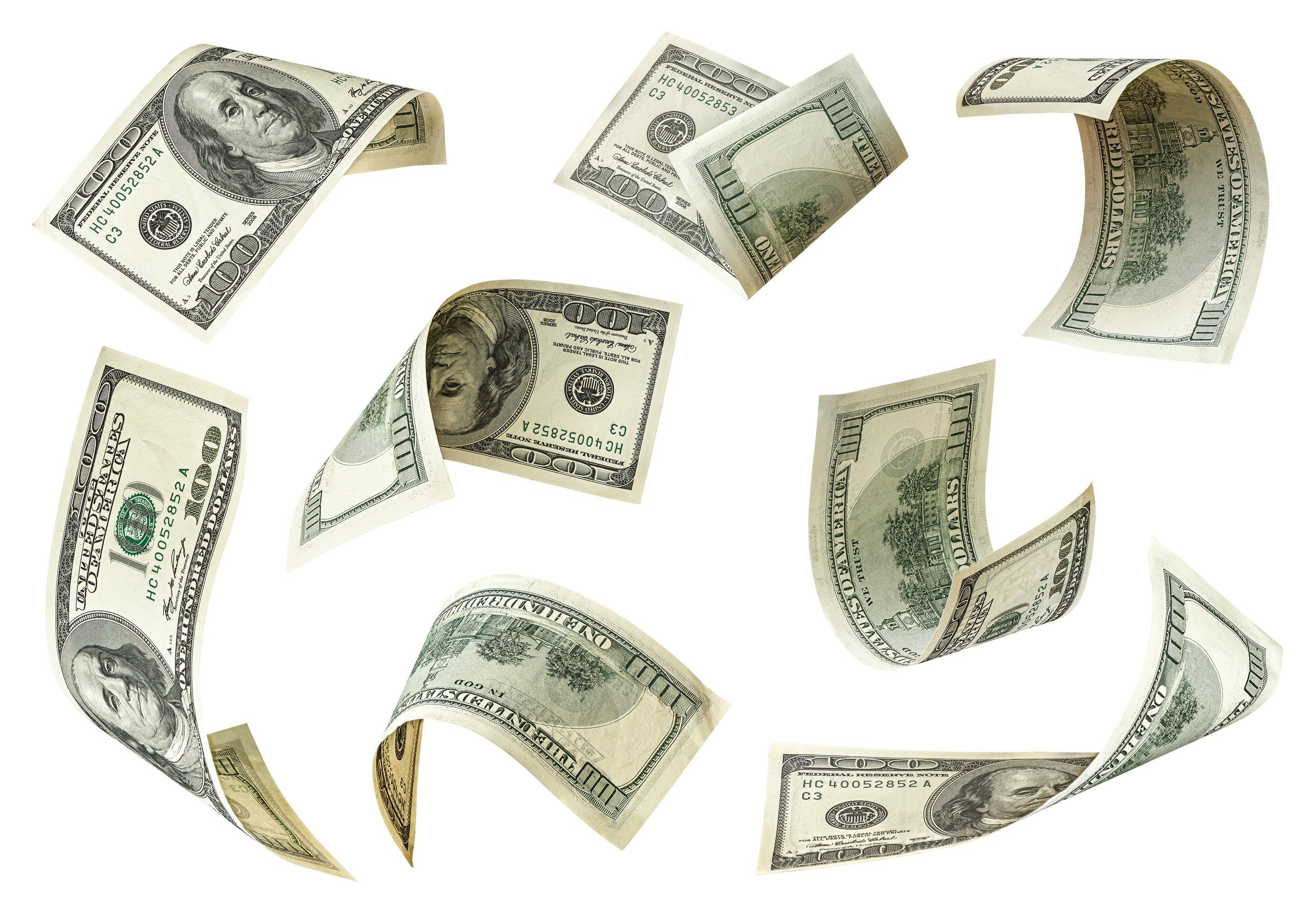 Floating U.S. dollar bills in various denominations.