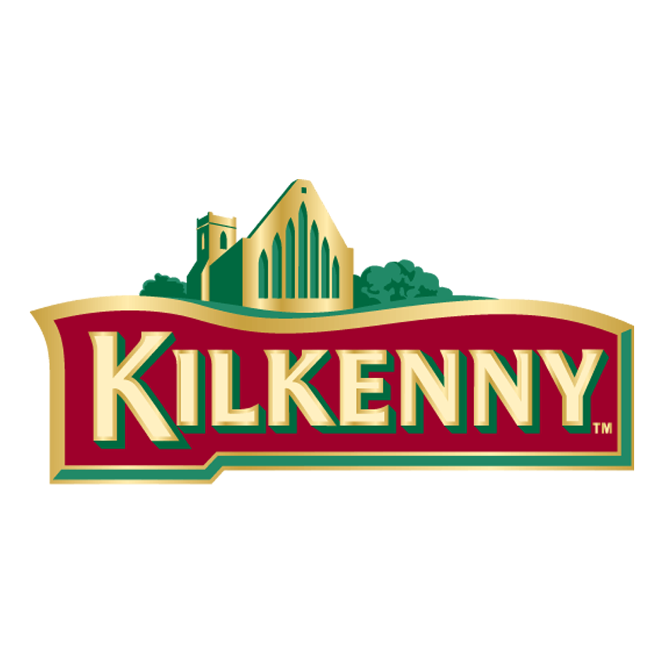 Logo of Kilkenny, featuring a stylized illustration of a castle and church in green and gold with red background and bold yellow-green text.