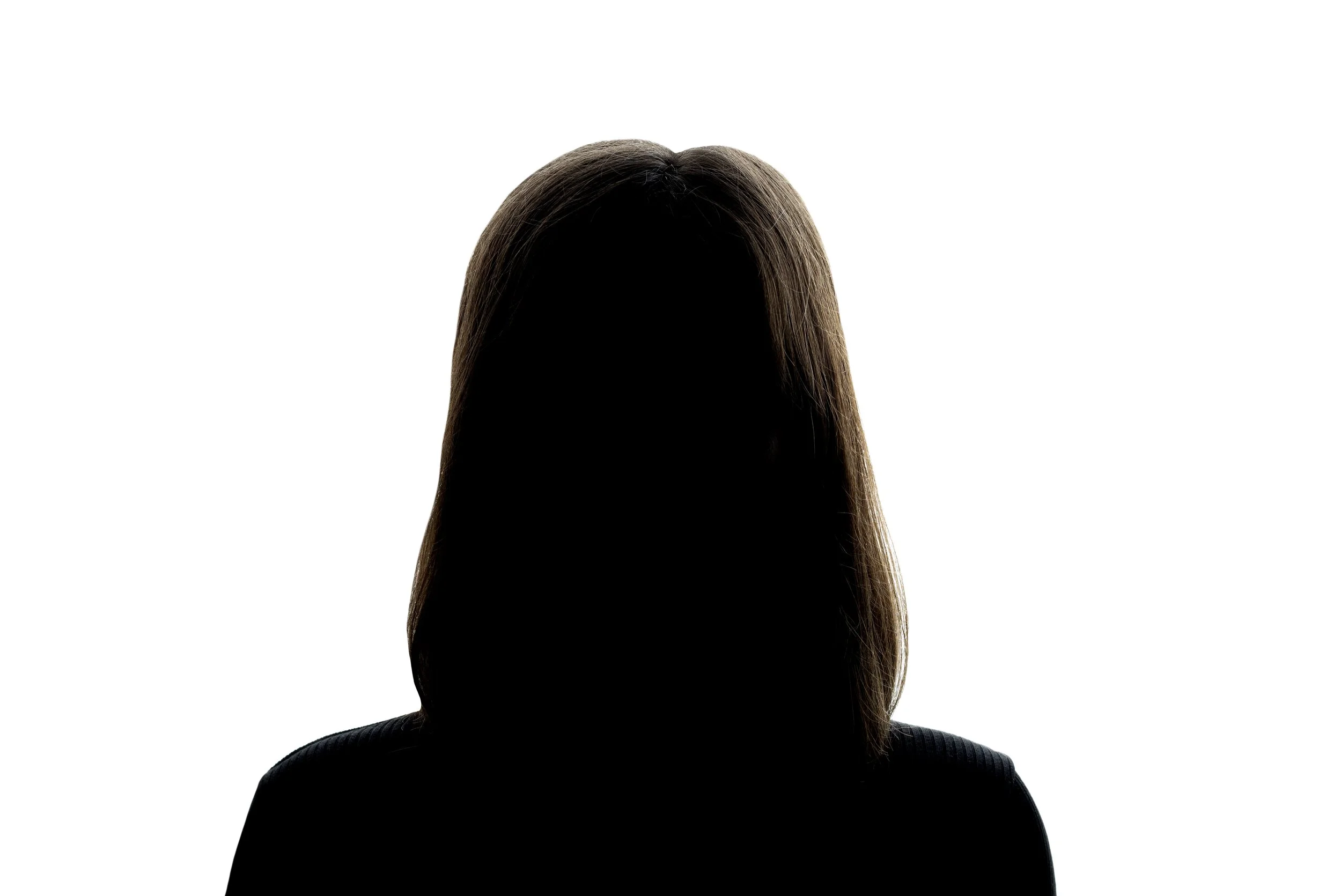 Silhouette of a person with shoulder-length hair against a white background.