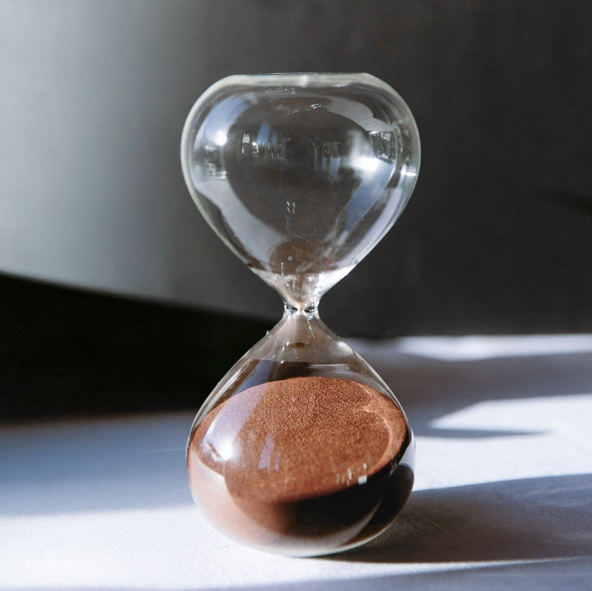 Hourglass representing timely and proactive workplace guidance.