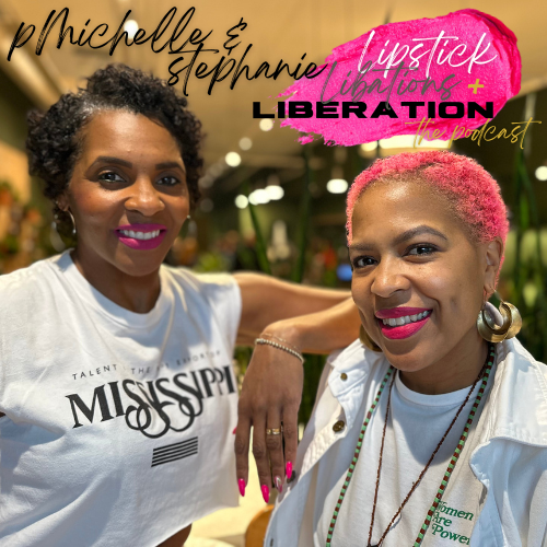 Two women smiling at the camera in a brightly lit indoor space, with one with short curly hair and the other with short pink hair, wearing casual white shirts and colorful accessories. The image has text overlay promoting a podcast called 'Michelle & Stephanie Lipsstick Liberation.'