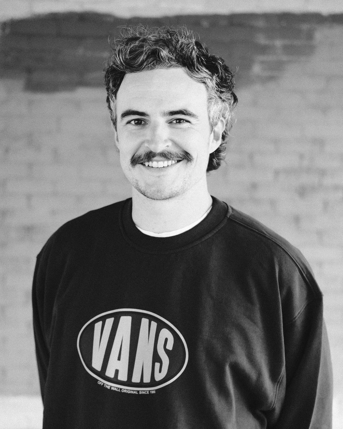 Black and white photo of Daryll J Buchanan, a wedding and elopement photographer in Ayrshire, Scotland.