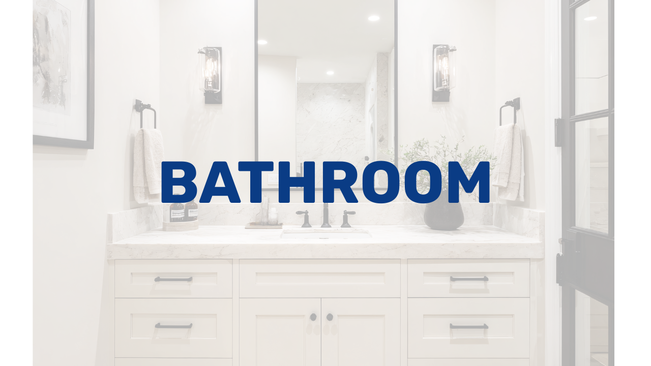 Modern bathroom with white vanity, marble countertop, large mirror, black fixtures, wall-mounted lights, towels, and potted plant.