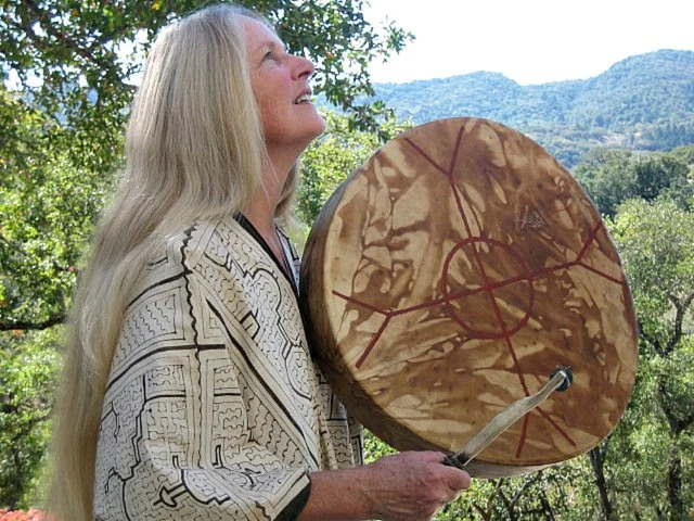 Shamanic drumming in nature for spiritual healing