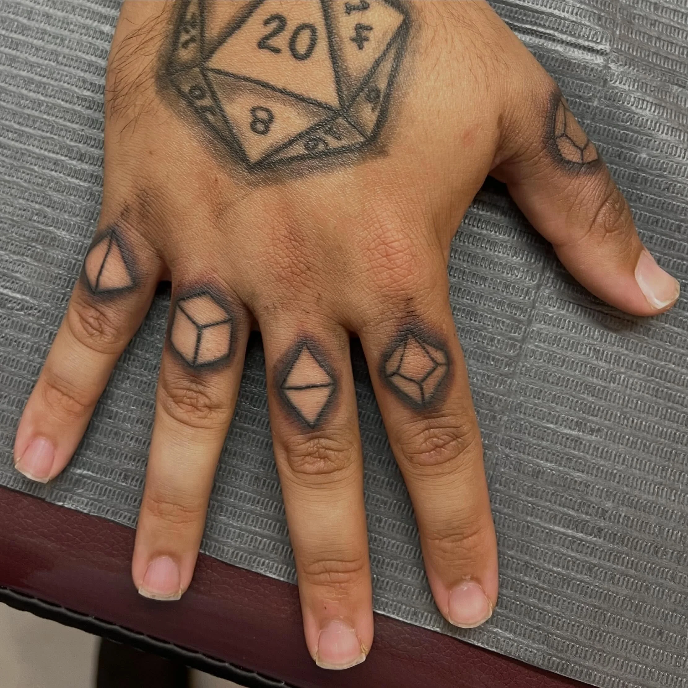 Roll a constitution saving throw. 

Jacob wanted to make sure he always had his dice on him. So we put the rest of them on his fingers 😁 thanks for the trust Jacob! 

If you to would like a Mattoo appointment text me 409-749-9161 and let&rsquo;s do 