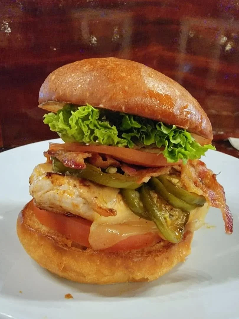 One of the locals favorites is the classic Angry Birds, which is a chicken sandwich that is grilled and juicy and delicious topped with cheese, jalapeños, bacon, lettuce, and tomato at the Waterworks restaurant Rockland, Maine