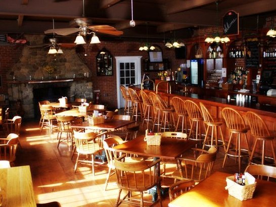 a view of the long and spacious full service bar and a section of our dining room at the Waterworks restaurant, Rockland, Maine