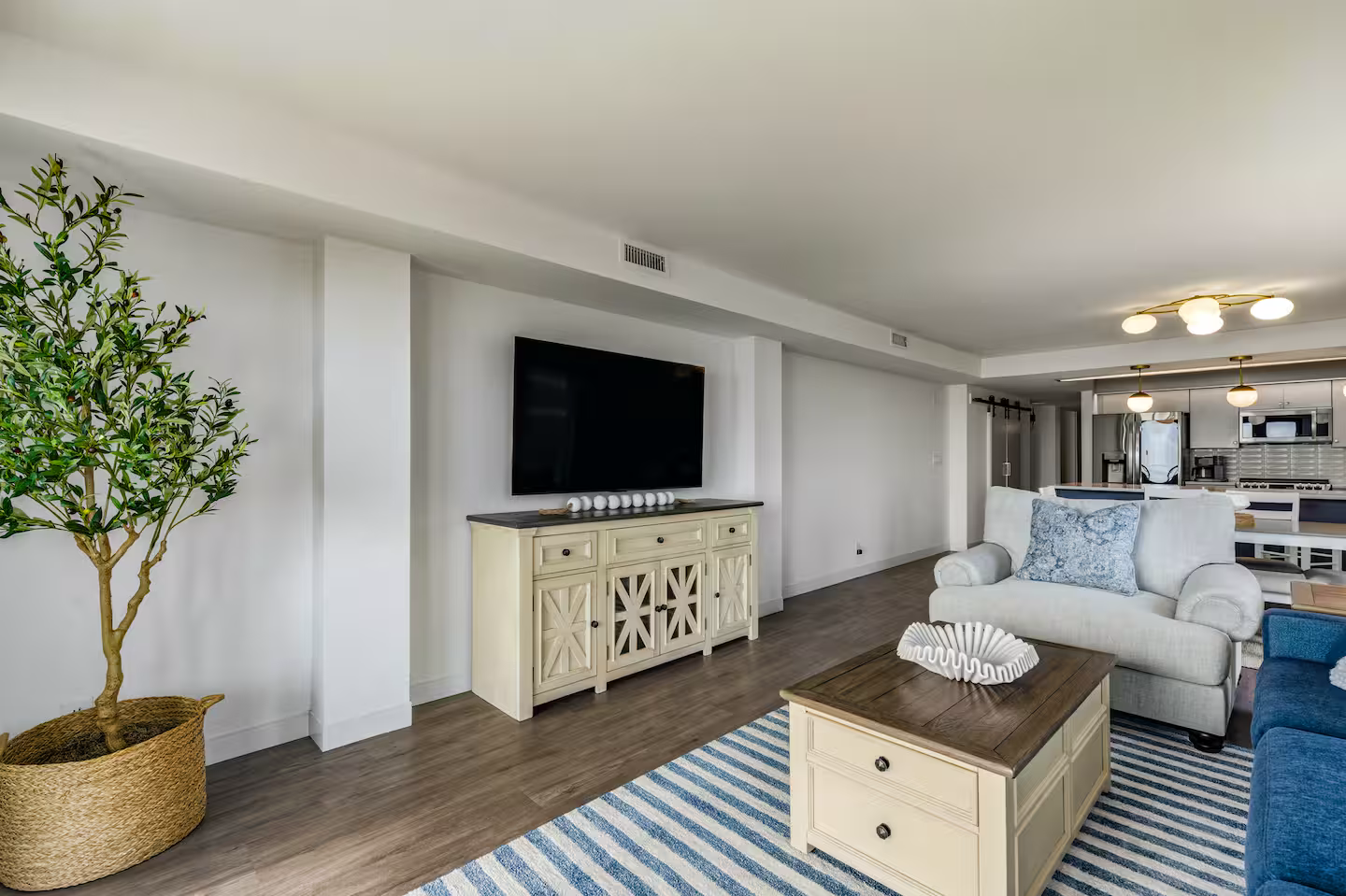 Spacious, comfortable gathering space designed for family movie nights, morning coffee, and winding down after exploring The Point at Cherry Grove.
