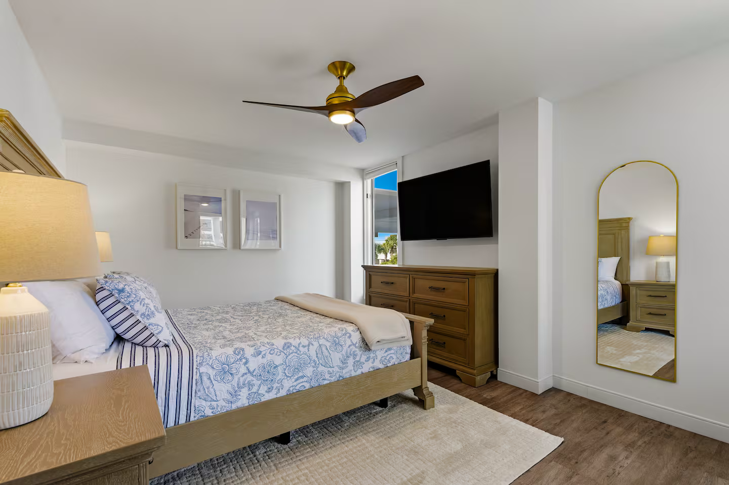 Master suite with new adjustable base mattress, crisp linens, and soft coastal décor for a peaceful ocean getaway.
