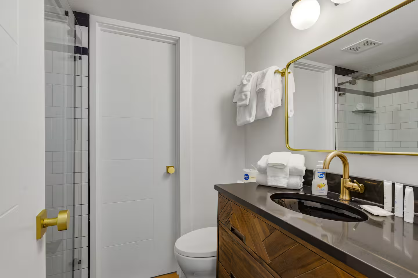 Clean, updated jack and jill bathroom with modern finishes, fresh towels, and thoughtfully stocked essentials for a comfortable stay in Cherry Grove.

