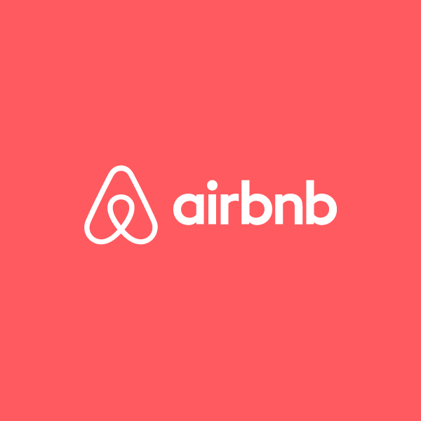 Airbnb logo with a pink background and white icon and text.