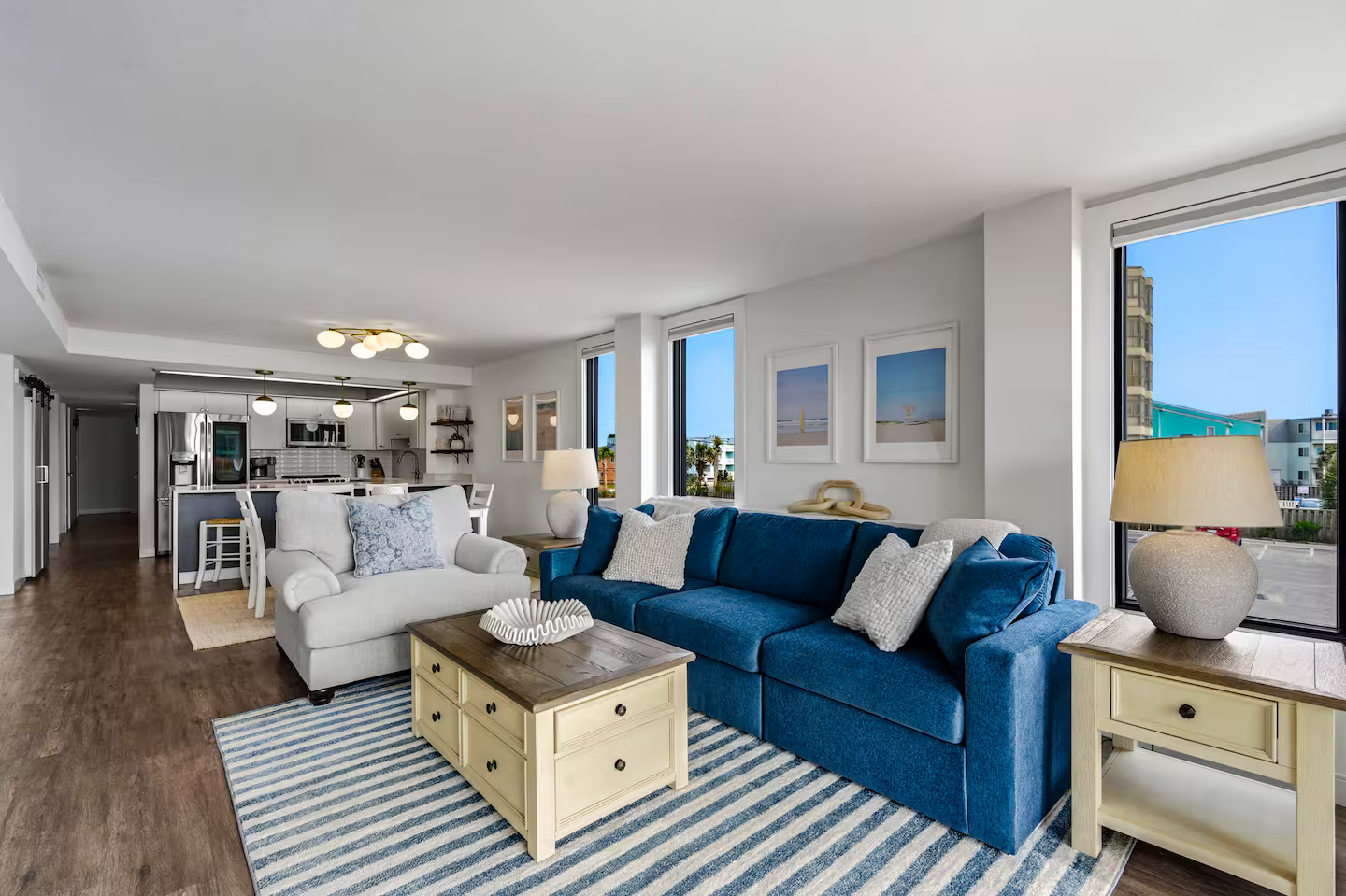 Open-concept coastal living with brand-new furnishings, spacious seating, Smart TV, and abundant natural light — designed for relaxing together after a day in North Myrtle Beach.