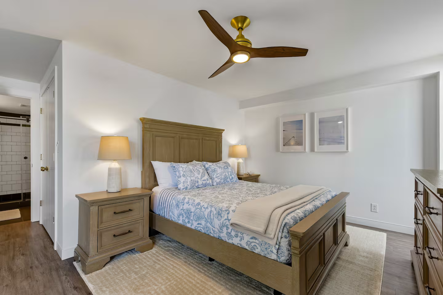 Freshly furnished master suite featuring a comfortable new mattress with and adjustable bed frame, smart TV, and serene coastal color palette - a comfortable retreat for your stay in North Myrtle Beach.
