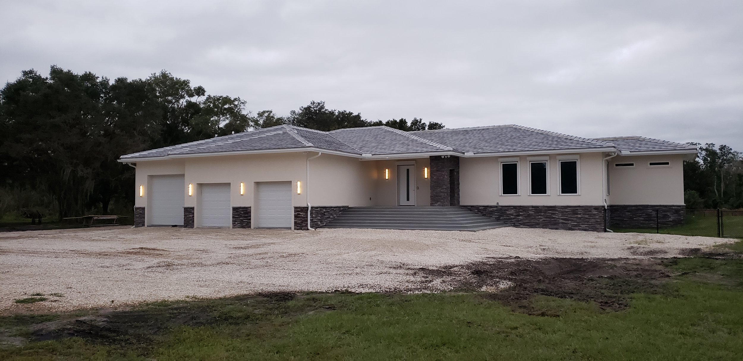 ICF Home Finished Elevation with Stone.jpg
