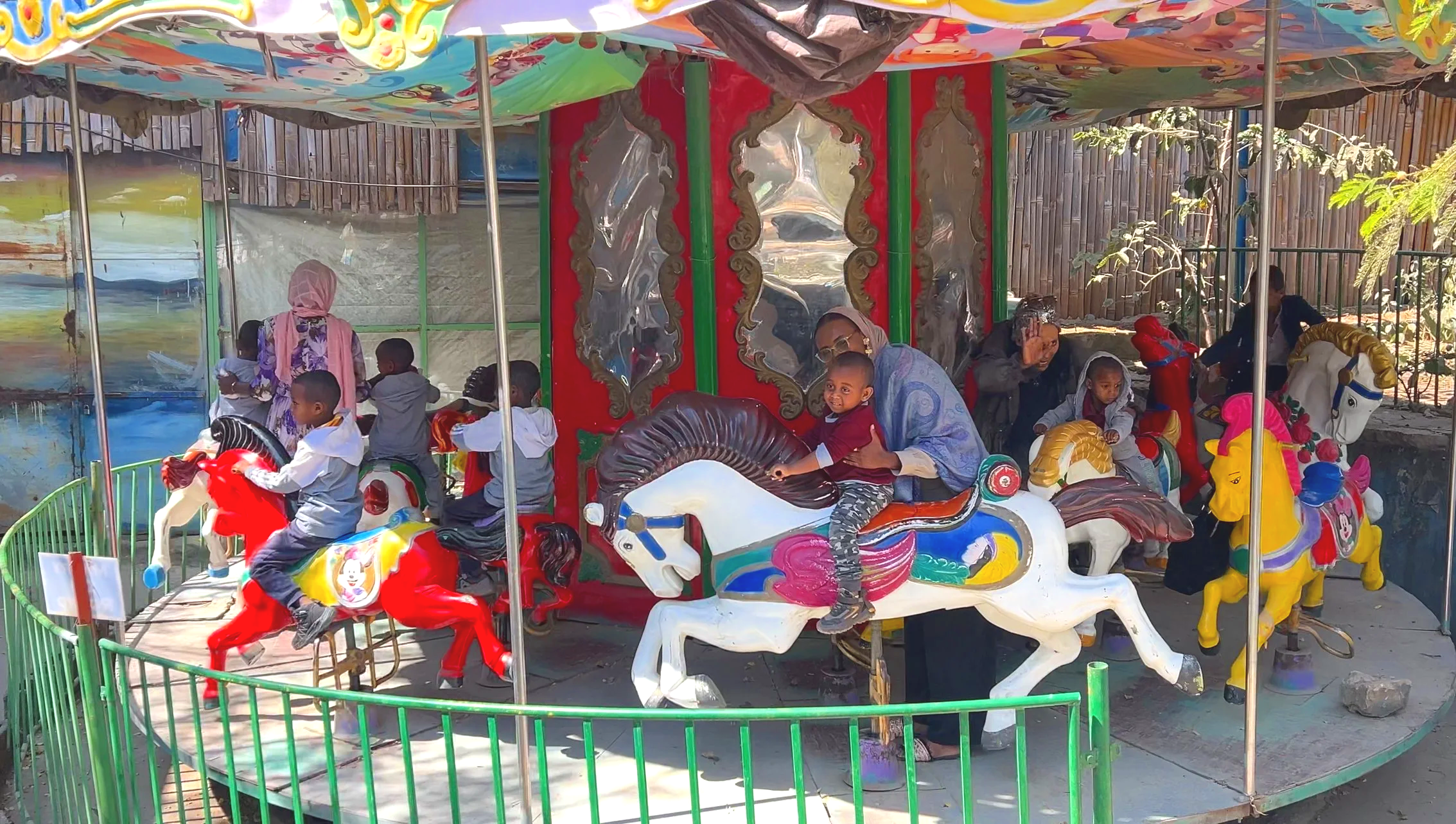smiling tigray children displaced by war playing together outdoors