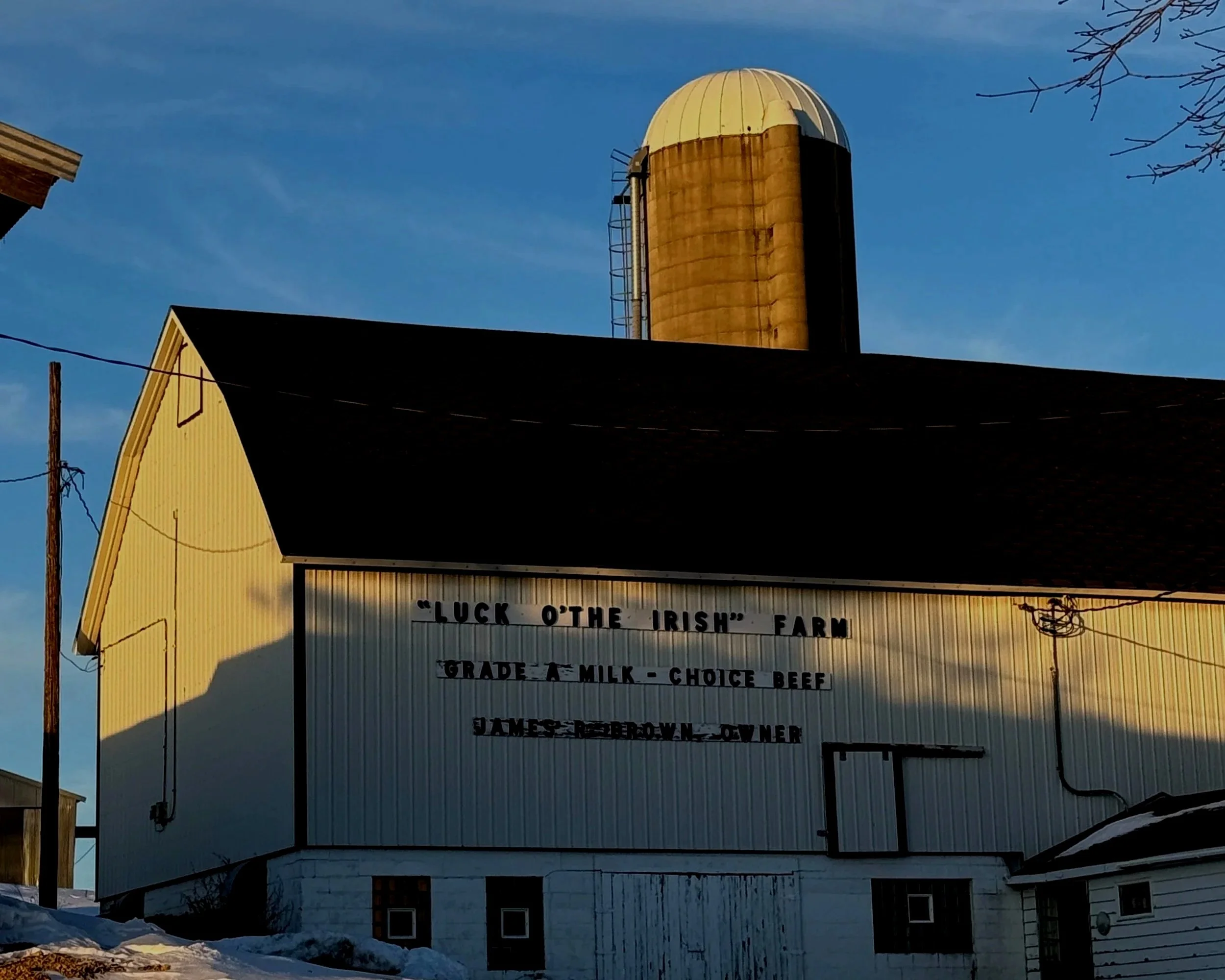 Historic barn at Luck of the Irish Farm in Roberts, Wisconsin, undergoing restoration as part of a family-owned farm and future distillery project.