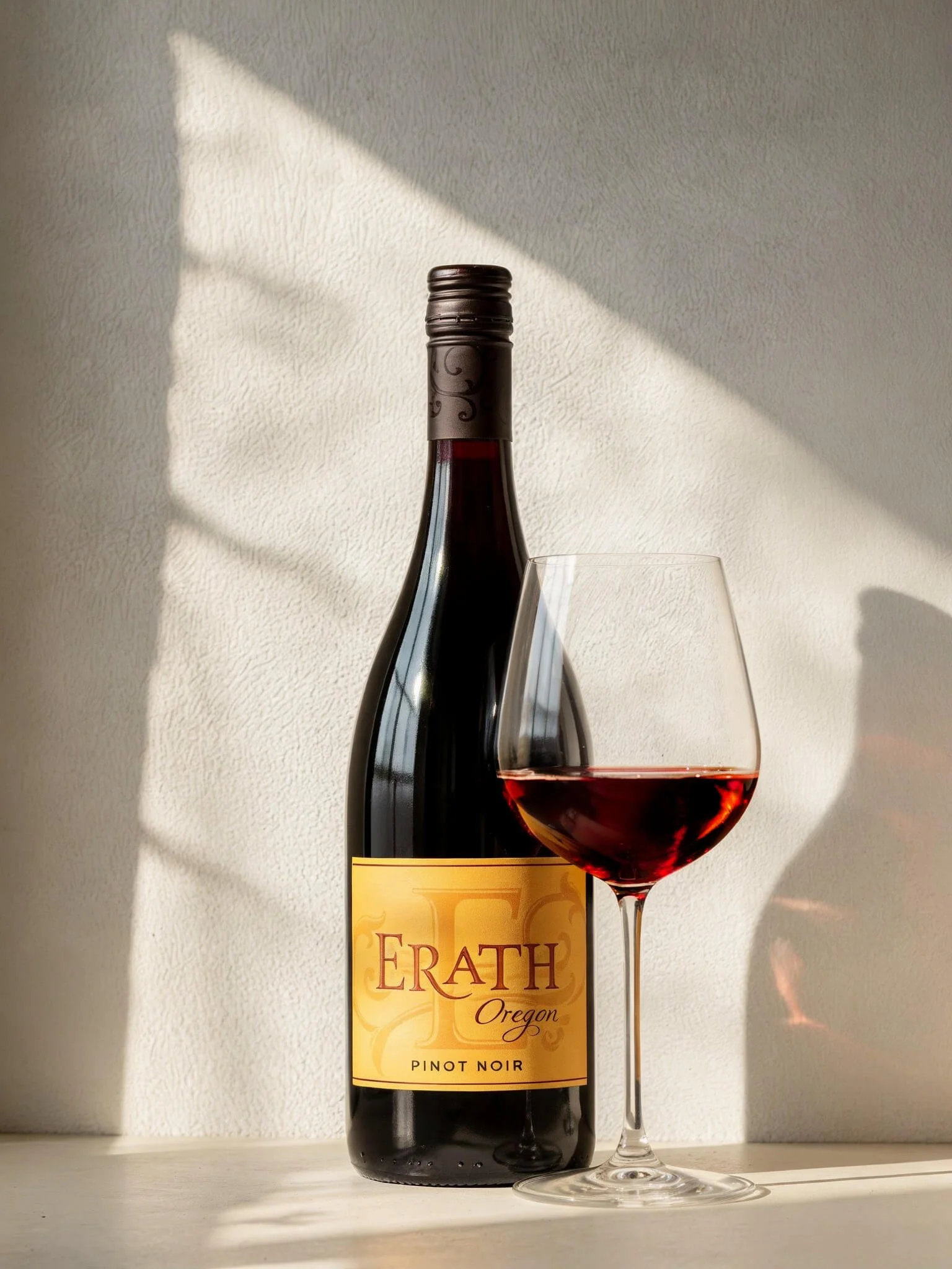 AI-generated lifestyle scene for Erath pinot noir wine, glass and bottle