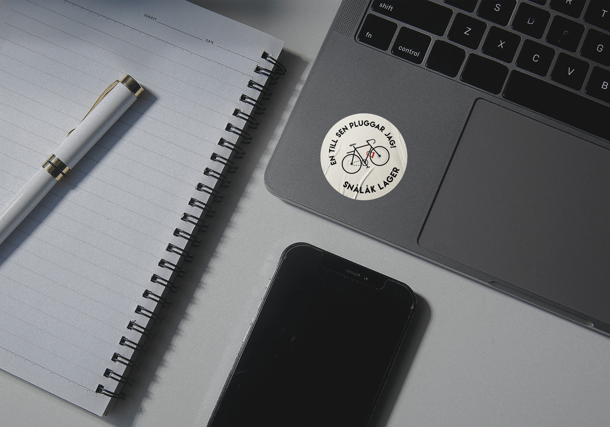 Snalak brand sticker on computer mockup