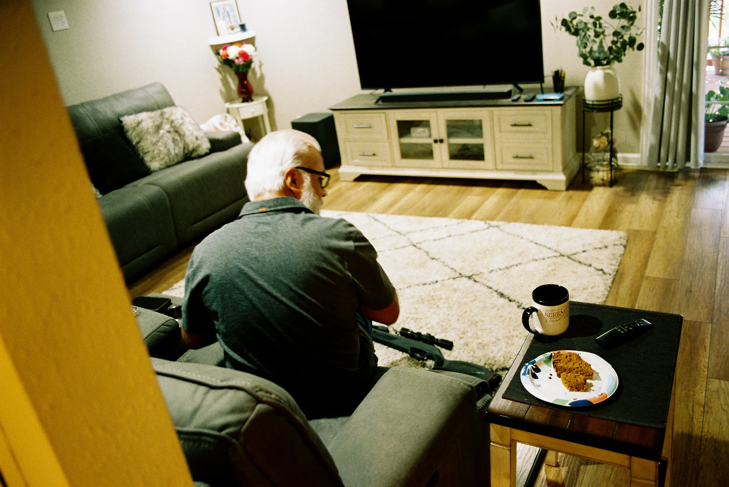 uncle george in his living room, austin tx, 2025