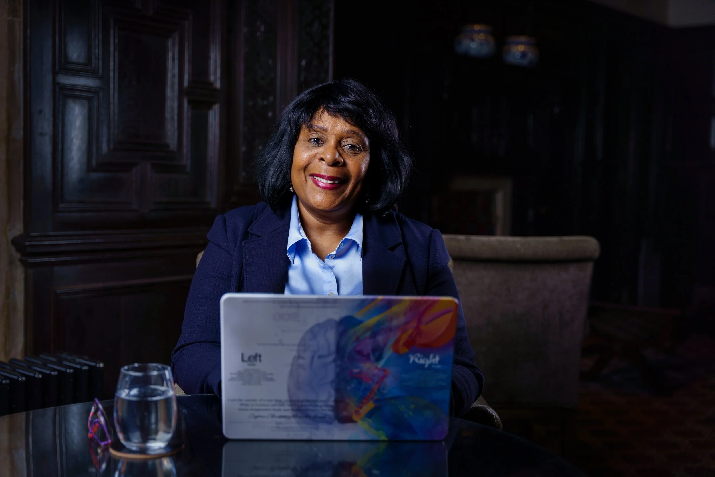 Christine Alexander-Smith behind her laptop