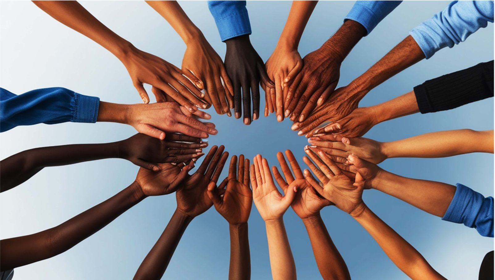 Multiple hands of diverse skin tones reaching toward the center, forming a circle against a light blue background.