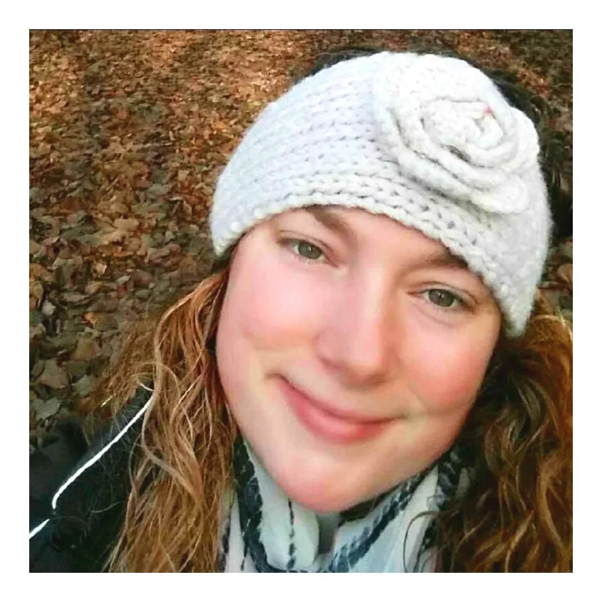 Sara the main trainer and owner of Barkasana Dog Training and Yoga Classes is outside smiling getting ready to train dogs with virtual dog training with Barkasana