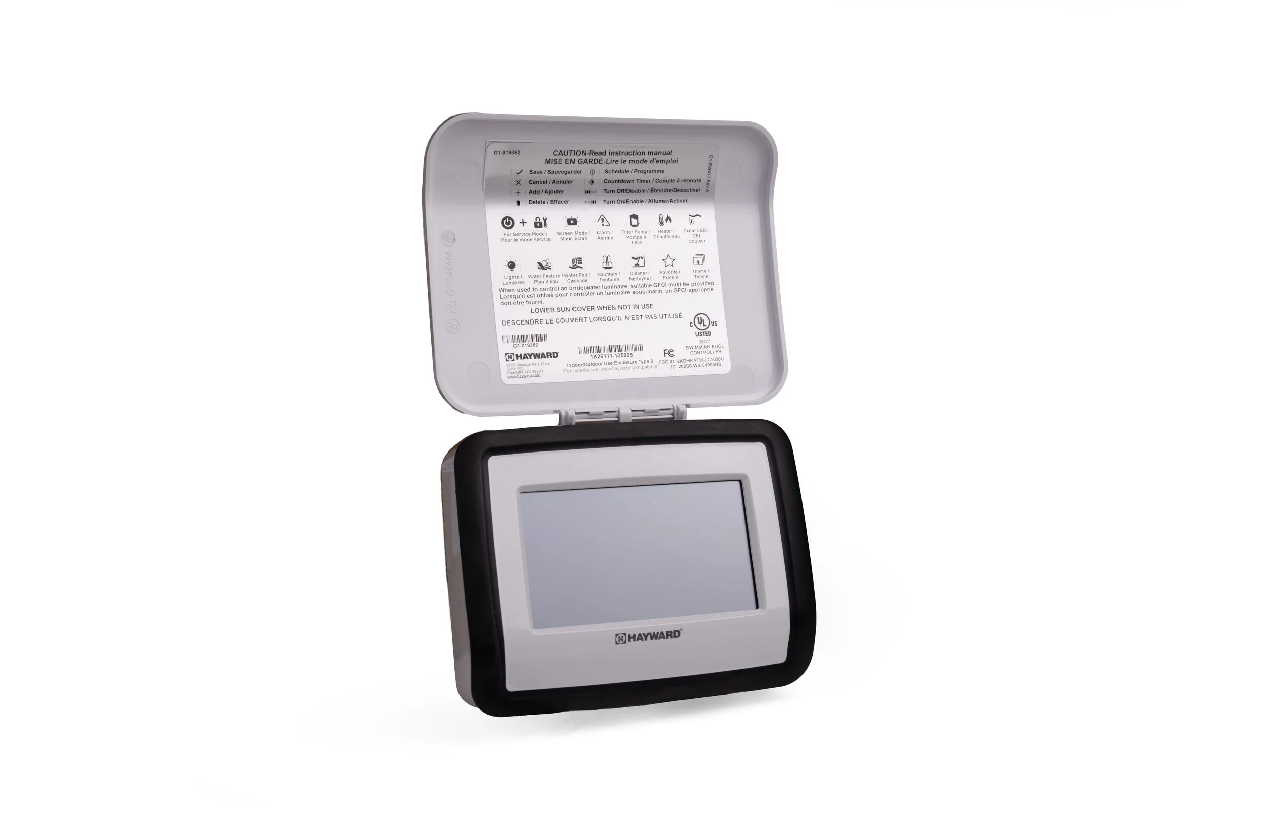 A handheld electronic device with a screen, branded 'Hayward', with a label on the inside of the lid containing instructions and icons.
