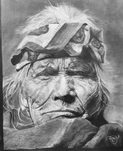 Black and white portrait of an elderly woman with deep wrinkles and a serious expression, wearing a bandana with a paisley pattern.