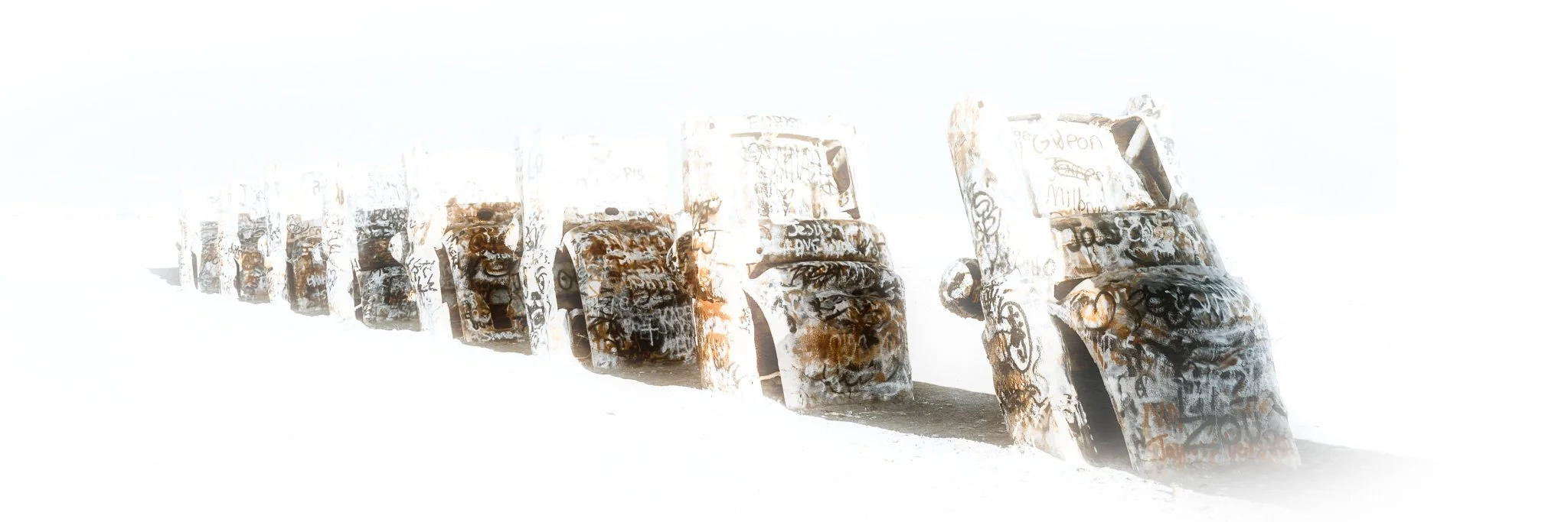 Cadillac Ranch Amarillo Texas — graffiti-covered buried Cadillacs in ethereal high-key infrared fine art photography