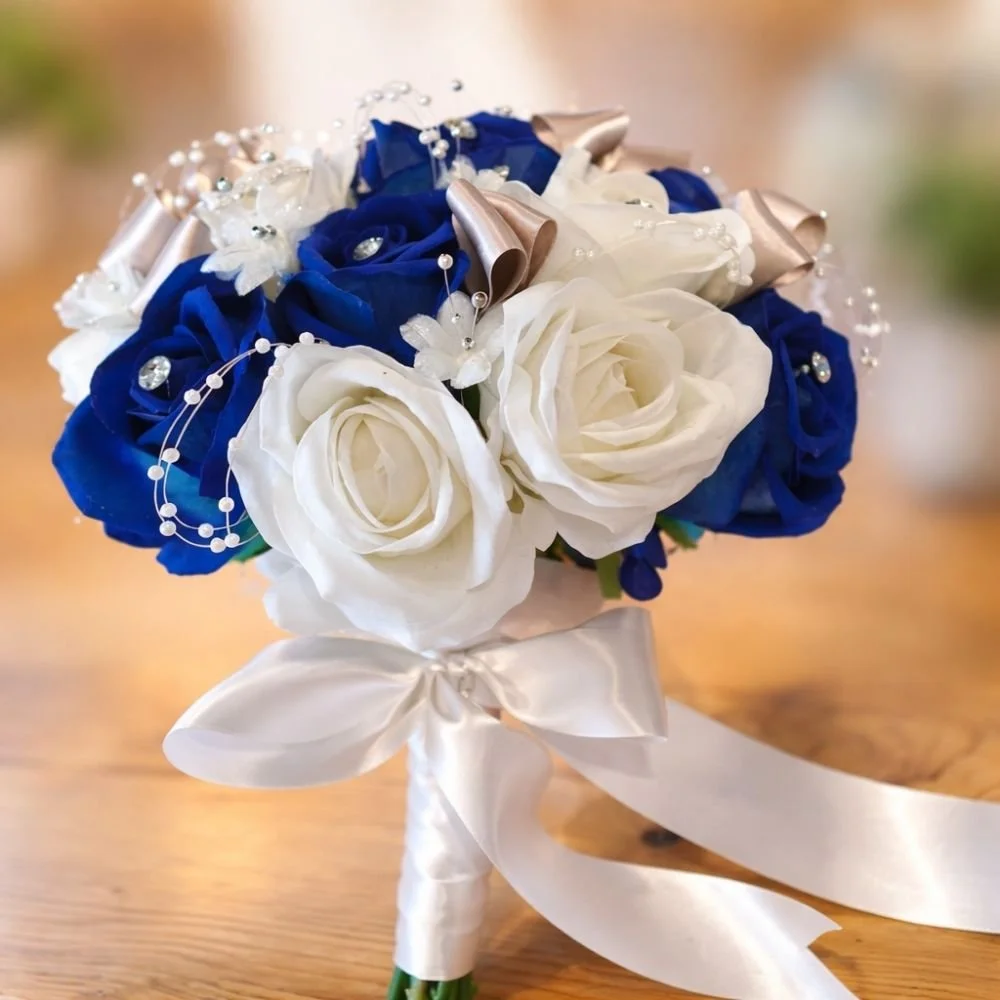 Cream and Blue silk flower arrangement for a bridesmaid